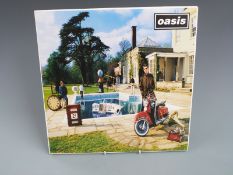 Oasis - Be Here Now (CRE LP 219) records appear Good, cover better