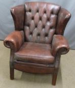 Leather Chesterfield wing backed armchair