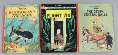 Herge three books comprising The Adventures of Tintin Red Rackham's Treasure published Methuen