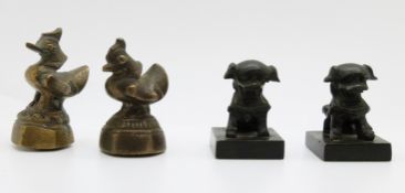 Two opium weights and two Chinese seals with Foo dog finials