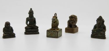 Three Tibetan statues and two stamps/ seals