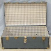 A metal bound twin handled vintage trunk, W91 x D50 x H37cm