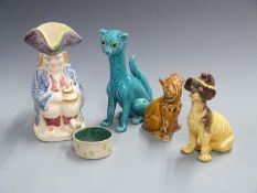 Brannam pottery Toby jug, Bretby or similar pottery cat with glass eyes, Brannam porringer and