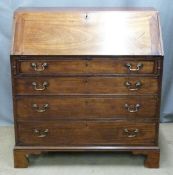 Georgian mahogany bureau with four graduated drawers, leather inset fall flap and fitted interior of