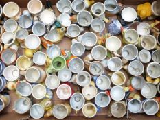 Approximately 80 novelty egg cups, mainly Japanese / foreign, kitsch and retro