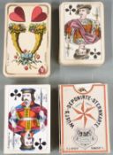 Four packs of C.L.Wust, Frankfurt playing cards, one pack having square corners, double ended
