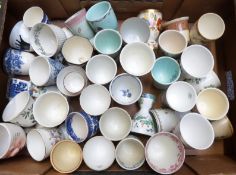 Approximately 42 large novelty egg cups including Royal Doulton, blue and white etc