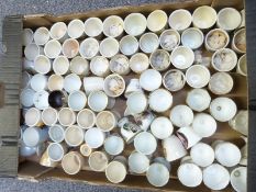Approximately 65 novelty egg cups including large quantity of Sandland, commemorative, kitsch, retro