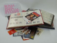Four stockbooks of mint Great Britain QEII stamps and booklets, high redeemable face value. Also