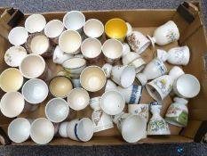 Approximately 45 novelty large size egg cups, probably for goose eggs including Royal Doulton,
