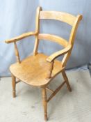 A 19thC elm seated armchair