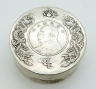 Chinese white metal box with dragon decoration and inset coin, 7.5 x 2.8cm