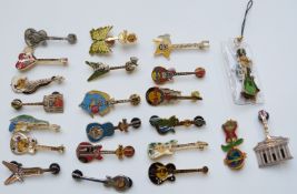 Twenty-two Hard Rock Café pin badges all in the form of guitars including Rome, Oralndo, Beijing,