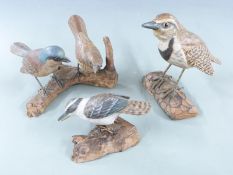 Four carved Chinese birds with marks to base, largest 15cm tall