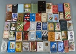 Approximately 50 packs of vintage playing cards, including LNER, De La Rue etc and a lacquer case