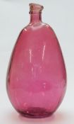 A hand blown cranberry glass bottle vase, 46cm tall