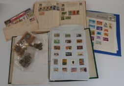 A box of all world stamp albums and sundry coins
