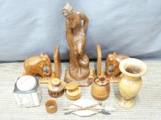 Carved fruitwood figurine, elephant bookends, turned laburnum wood vase, treen items etc