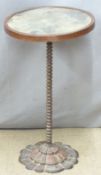 A bronze table with mirrored top, diameter 38cm x H65cm