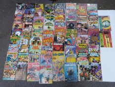 Seventy-four DC comics including Night Force, The Ray, Adventure Comics, Impulse, Mister Miracle,
