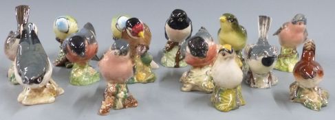 Fourteen Beswick birds