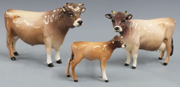 Beswick Jersey bull, cow and calf