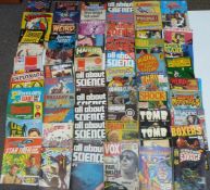 A large collection of comic books and magazines including All Bout Science, Star Trek, Stingray,