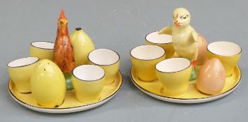Two Crown Devon kitsch egg cruets with duck and chicken handles, tallest 11cm