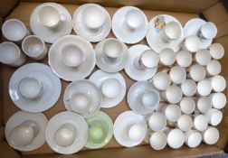 Approximately 47 novelty egg cups, all crested ware, including Goss, Arcadian, unmarked etc