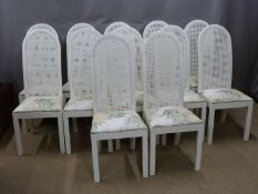 Twelve painted bergère dining chairs