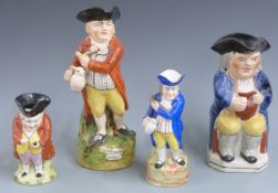 Four 19thC / 20thC Toby character jugs smoking and drinking