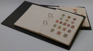 Two albums of Middle East, Africa, Far East and Pacific stamps, all periods