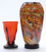 Art glass pedestal vase with mottled decoration, 21cm tall, together with a millefiori glass lamp,