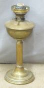 A brass oil lamp, H49cm