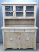 A glazed pine dresser, W144 x D62 x H191cm