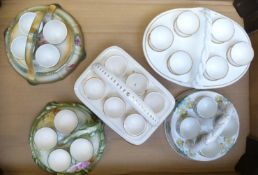 Five egg cruets including Burleigh and porcelain examples probably Spode / Minton, tallest 12cm