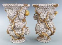 Pair of 18thC Meissen Schneeballen pedestal vases with applied canary and gilded vine decoration,