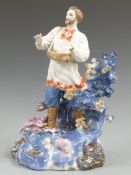 Russian pottery figure of Georgi Nelepp with script to base and USSR stamp, H33cm