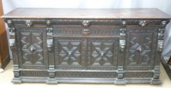 19thC carved oak breakfront sideboard with lion mask and geometric decoration in the Gothic