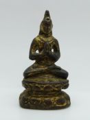 Eastern bronze statue of Guanyin with gilt detail, 7.8cm