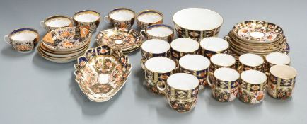A collection of Royal Crown Derby/ Derby and Davenport Imari teaware including 2451 pattern