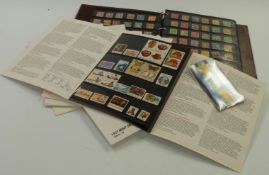 A stockbook of USA stamps, all periods, and The United States Postal Service mint sets of