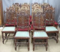 A harlequin set of 18 carved oak upholstered dining chairs, all with grape and vine carving and