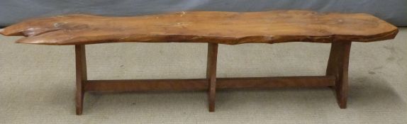 A naturistically styled yew bench, W170 x D32 x H35cm
