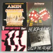 Approximately 100 albums including Bad Company, The Beat, Be Bop Deluxe, Bob Dylan, Cream, Dire