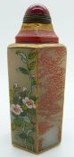Chinese snuff bottle with painted floral decoration and hardstone stopper, 7.9cm high
