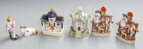 19thC Staffordshire spill vases, pastille burners, recumbent cow and a Meissen style porcelain