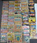 A collection of comic books magazines including Eagle, Marvel Hulk, Fantastic and Curtis Marvel