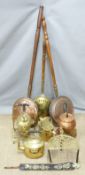Copper and brass ware including three bed warmers, spirit kettle, watering can, copper spirit