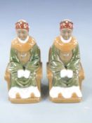 Pair of 20thC Japanese seated figures with maker's marks to base, H22cm
